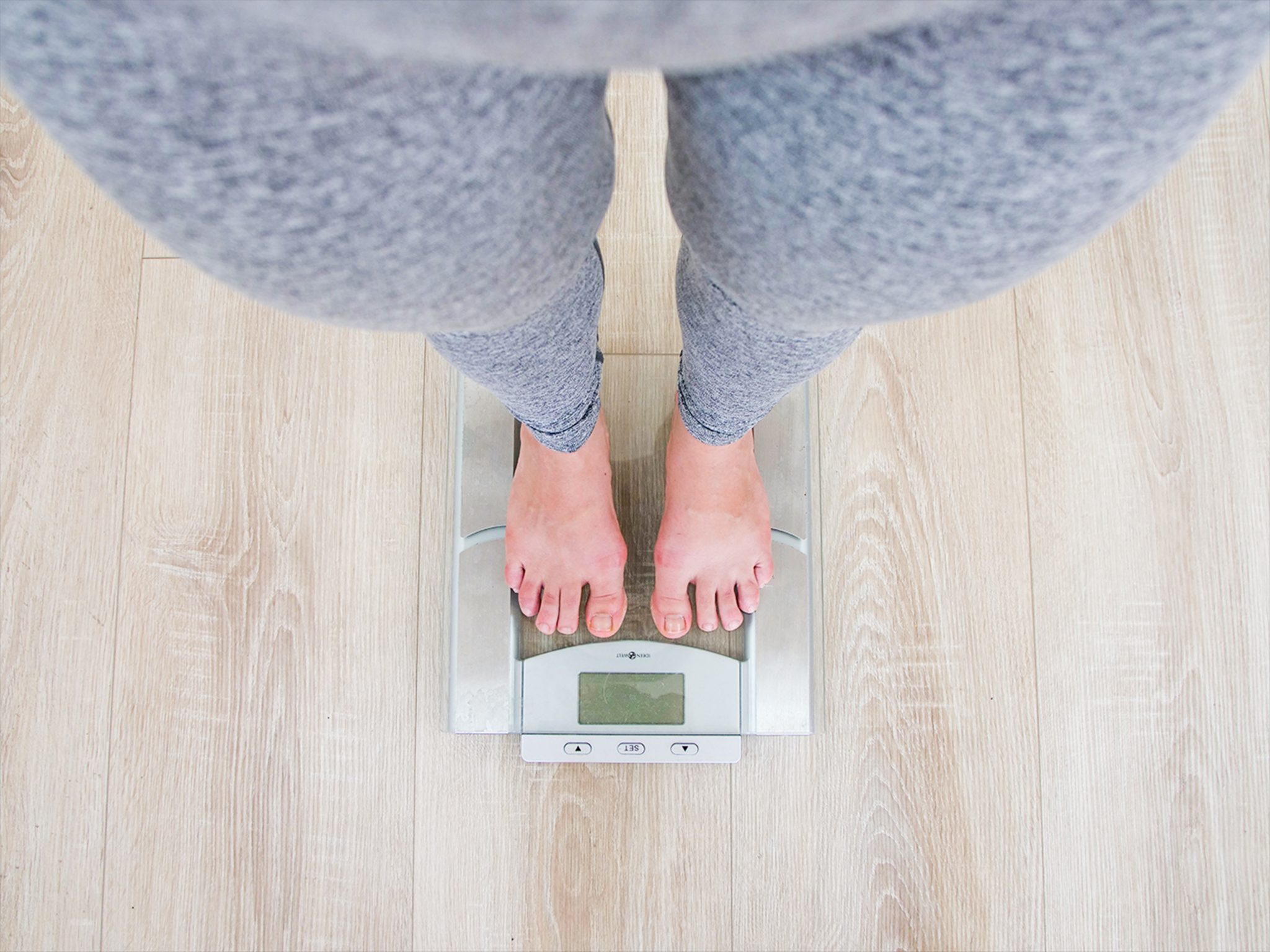 Women on weighing scales